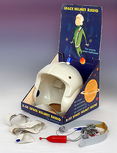 This amazing X-50 Space Helmet Radio from Hearever is a crystal radio from around 1960s. In the early 20th century, crystal radios were the first radios. Early ones were serious looking-but they survive today in the form of toys. They use no batteries or other power to receive stations but are powered by the faint signals from broadcasting stations themselves. From the web's largest private collection of antiques & collectibles: https://www.ericwrobbel.com/collections/crystal-radios.htm