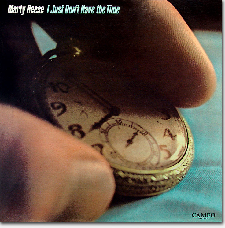 Record album cover for the tax shelter record credited to Marty Reese, 'I Just Don't Have the Time,' Cameo Records, Album World, a division of International Record Distributing Associates. From the designer's website: https://www.ericwrobbel.com/art/martyreesealbum.htm