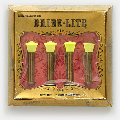 'Signal for a refill with Drink-Lite.' The box further explains: 'Never go dry! Clip Drink-Lite to your empty glass, it lights up, then flashes. Lights up automatically when placed on the rim of a glass. Glows brightly for several seconds, then flashes on and off. Keeps on blinking until removed from glass.' (Or your host strangles you). Drink-Lite, Cincinnati, Ohio. From the web's largest private collection of antiques & collectibles: https://www.ericwrobbel.com/collections/drinks-2.htm