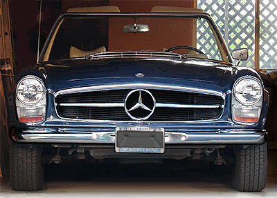 The dedicated collector will even display things in the garage--usually things associated with auto maintenance or housekeeping. Things you wouldn't really display in the house. But the perfect 'garage collectible' is a car! Like this 1967 Mercedes-Benz 250 SL convertible, known especially for its concave-shaped, removable 'pagoda' hardtop. From 'Garage/Utility Collectibles' at the web's largest private collection of antiques & collectibles: https://www.ericwrobbel.com/collections/garage.htm