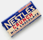 Vintage Nestle's Crunch chocolate bar (manufactured by Peter Cailler Kohler Swiss Chocolates Co., Inc., N.Y., USA, c. 1940). From 'The Box It Came In' at the web's largest private collection of antiques & collectibles: https://www.ericwrobbel.com/collections