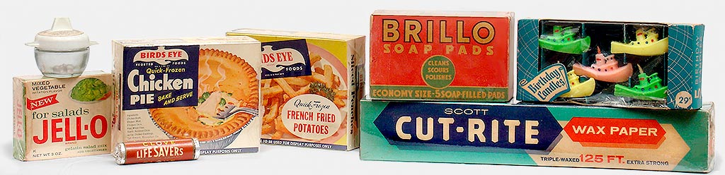 Vintage kitchen collectibles: Sweet*10 with saccharin AND sodium cyclamate, Mixed-Vegetable flavor Jello (yum!), Birds Eye Quick Frozen Chicken Pie and French Fried Potatoes, Brillo Soap Pads, Cut-Rite Wax Paper, and birthday candles shaped like little boats. From 'Kitchen Collectibles' at the web's largest private collection of antiques & collectibles: https://www.ericwrobbel.com/collections/kitchen-collectibles.htm
