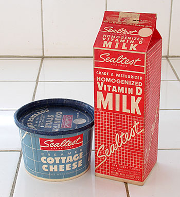 When I was very young, the Sealtest truck came to our house and left milk inside a little door on the outside of our kitchen that could be retrieved behind a similar door inside the kitchen. I'm reminded how long ago that was when I realize that that truck wasn't even refrigerated; on hot days I'd ask for, and get, a hunk of ice from the milkman. From 'More Kitchen Collectibles' at the web's largest private collection of antiques & collectibles: https://www.ericwrobbel.com/collections/kitchen-2.htm