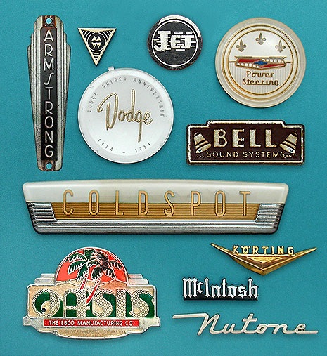 Vintage lettering nameplates: One technique highly-prized for its candy-like quality is 'underpainted plastic,' sometimes called 'reverse-paint plastic.' Examples here are Coldspot (from a refrigerator) and the steering wheel buttons from Dodge and Chevrolet. Also here: 'MW' (Montgomery Ward), McIntosh, Bell Sound Systems, Oasis (water cooler), Nutone (fans, dorbells), Körting radios. From the web's largest private collection of antiques & collectibles: https://www.ericwrobbel.com/collections