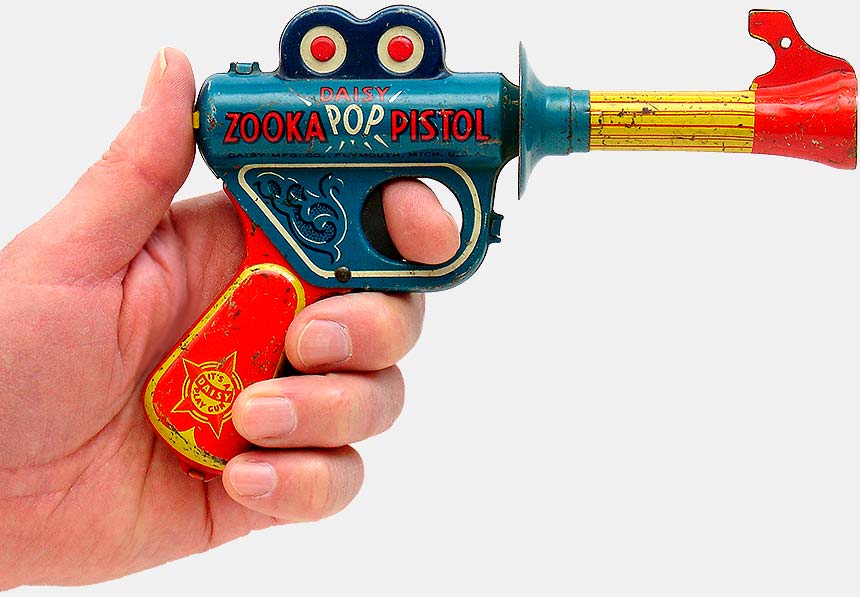 Collectible Daisy Zooka Pop Pistol (1952, USA), a pop gun that shoots a cork. From 'Toy Guns, Space Guns' at the web's largest private collection of antiques & collectibles: https://www.ericwrobbel.com/collections/toy-guns.htm