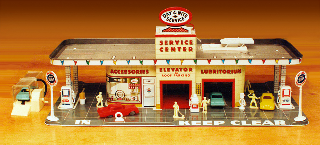 Vintage Marx Day & Nite Service Center (c.1960, USA) is complete right down to the little sponge in the car washing bucket. From 'More Toys' at the web's largest private collection of antiques & collectibles: https://www.ericwrobbel.com/collections/toys-more.htm