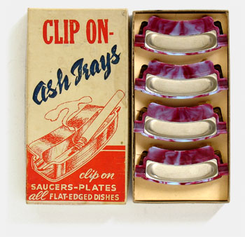 Clip On Ash Trays. Clip those smokes right onto your plate! These little trays 'put guest smokers at their ease' and 'compliment the thoughtful hostess.' Manufactured by Williams and Associates, Inc., San Diego, CA. c.1950s. From 'Collecting the Wacky' at the web's largest private collection of antiques & collectibles: https://www.ericwrobbel.com/collections/wacky.htm